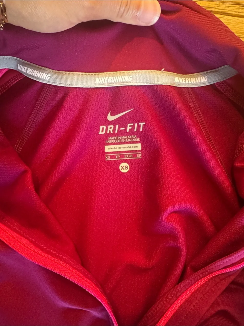 Nike Women's Magenta Half-Zip Pullover with Pink Sleeve Stripes
